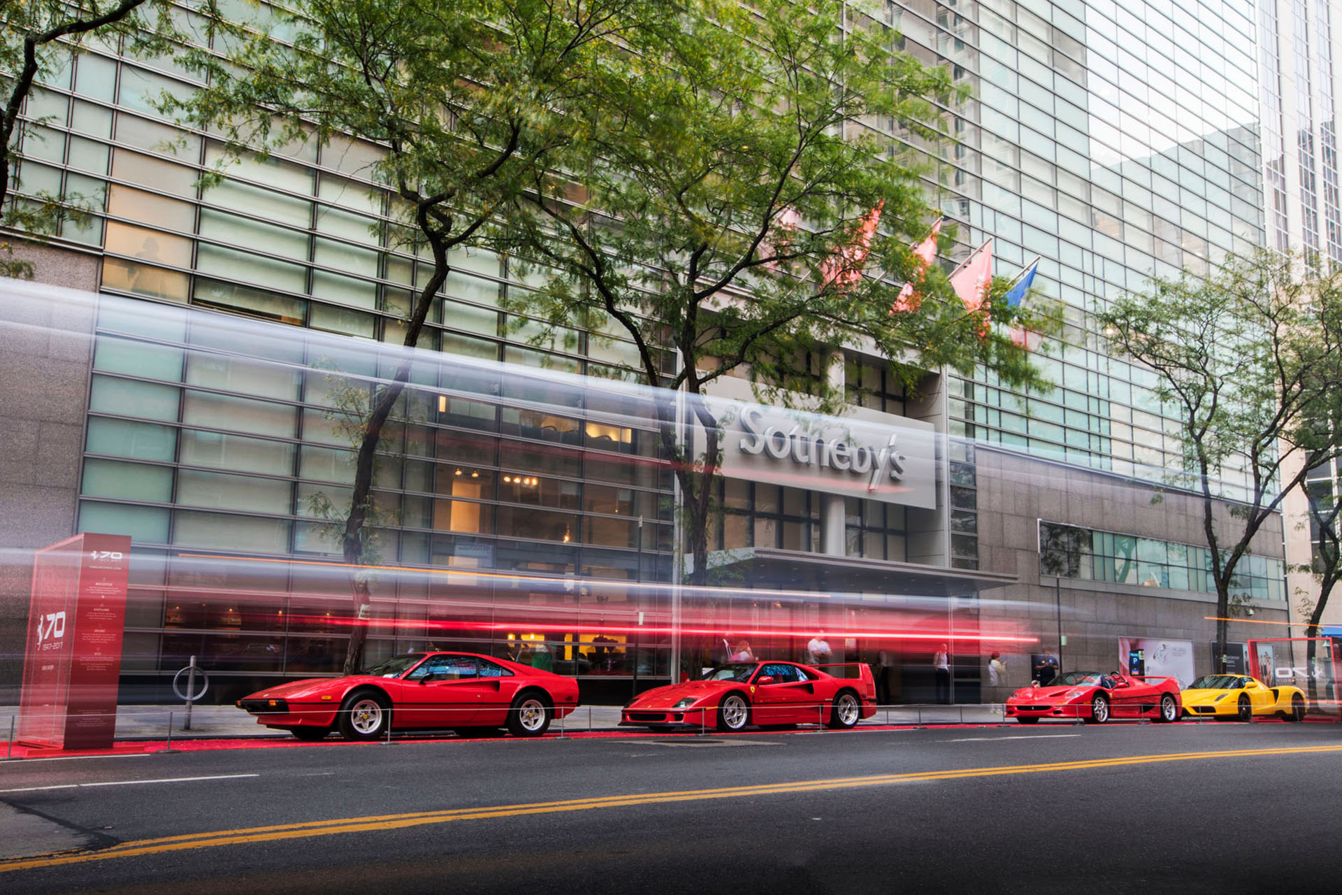 Ferrari's parked in front of Sotheby's